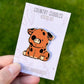 Oxford Sandy and Black Enamel Pin